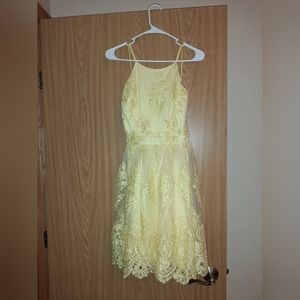 Yellow criss-cross back prom dress